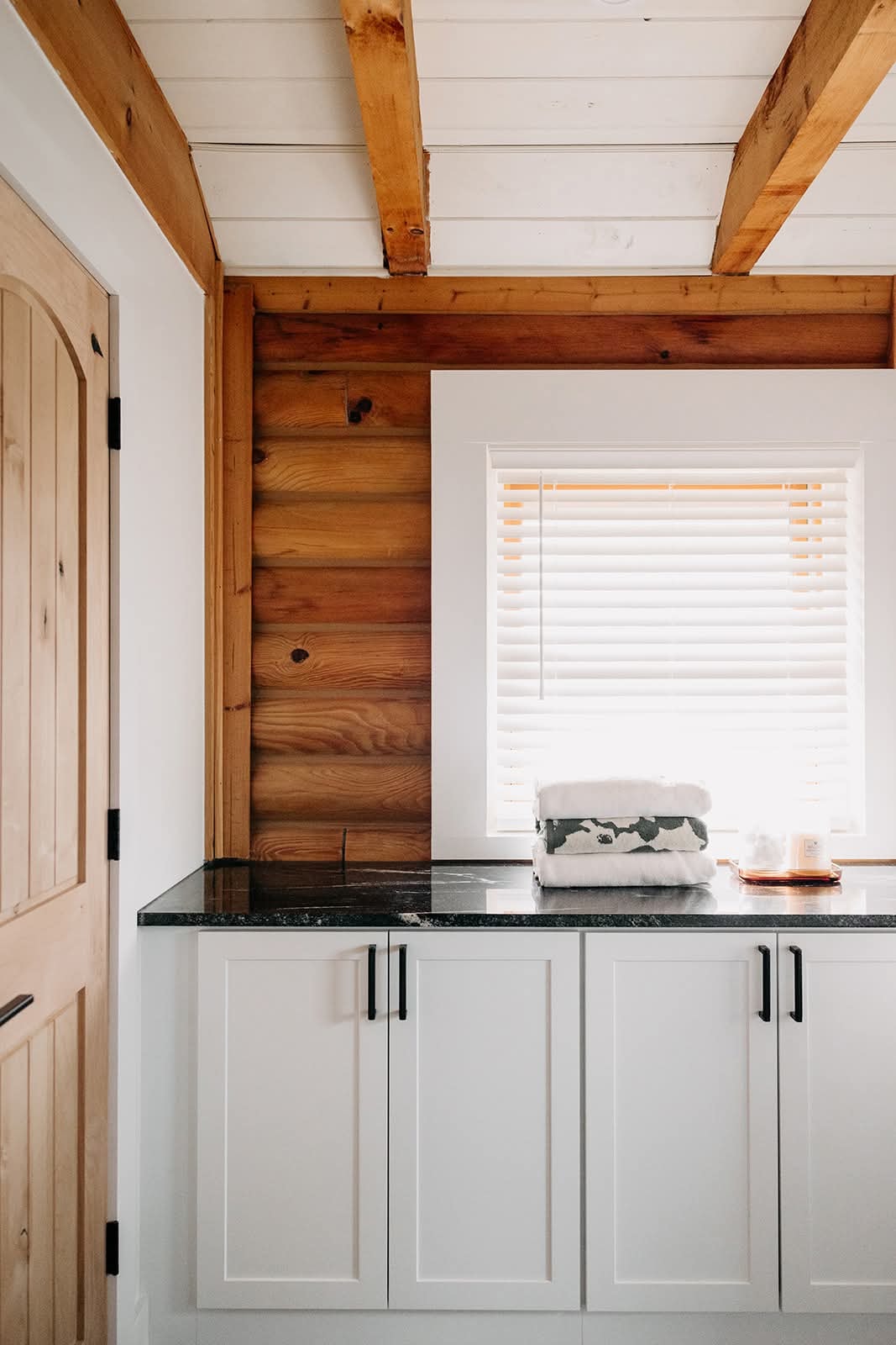 Bathroom remodel with rustic beams by PrestigeCore