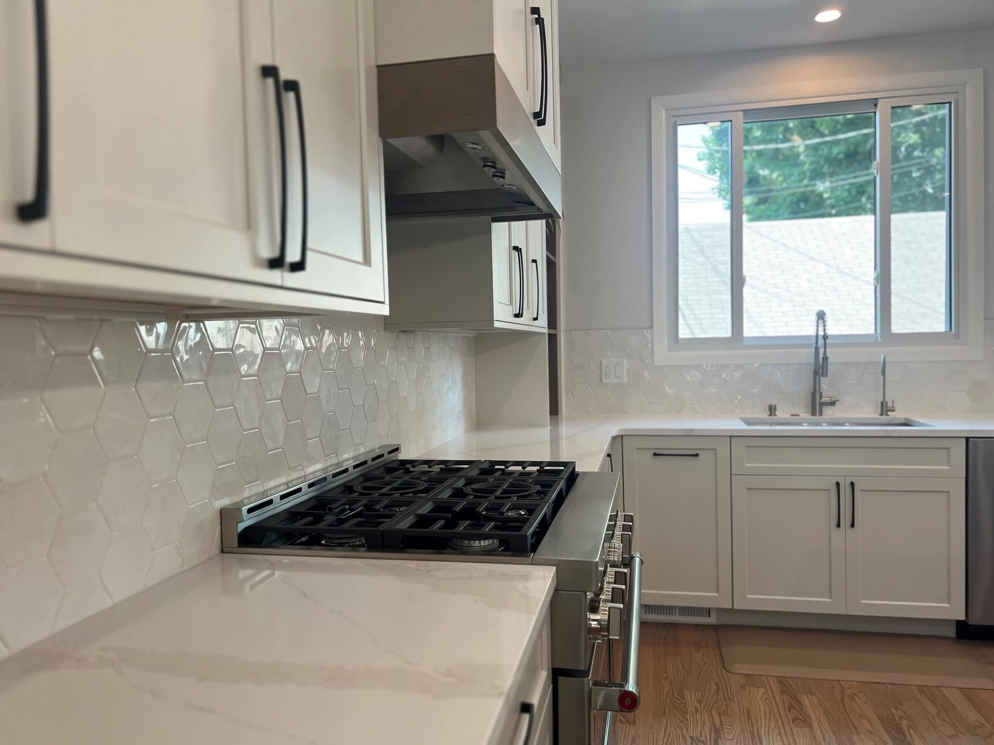 Greenwood Village kitchen — hexagon tile backsplash detail