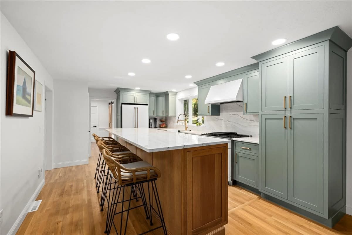 Sage green kitchen remodel by PrestigeCore