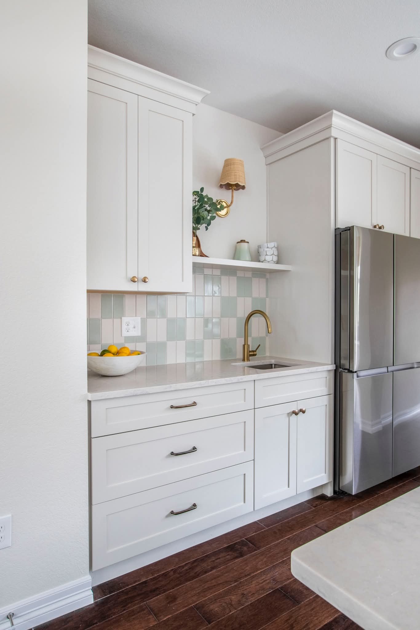 Denver kitchen — white shaker cabinetry with stainless appliances and quartz countertops