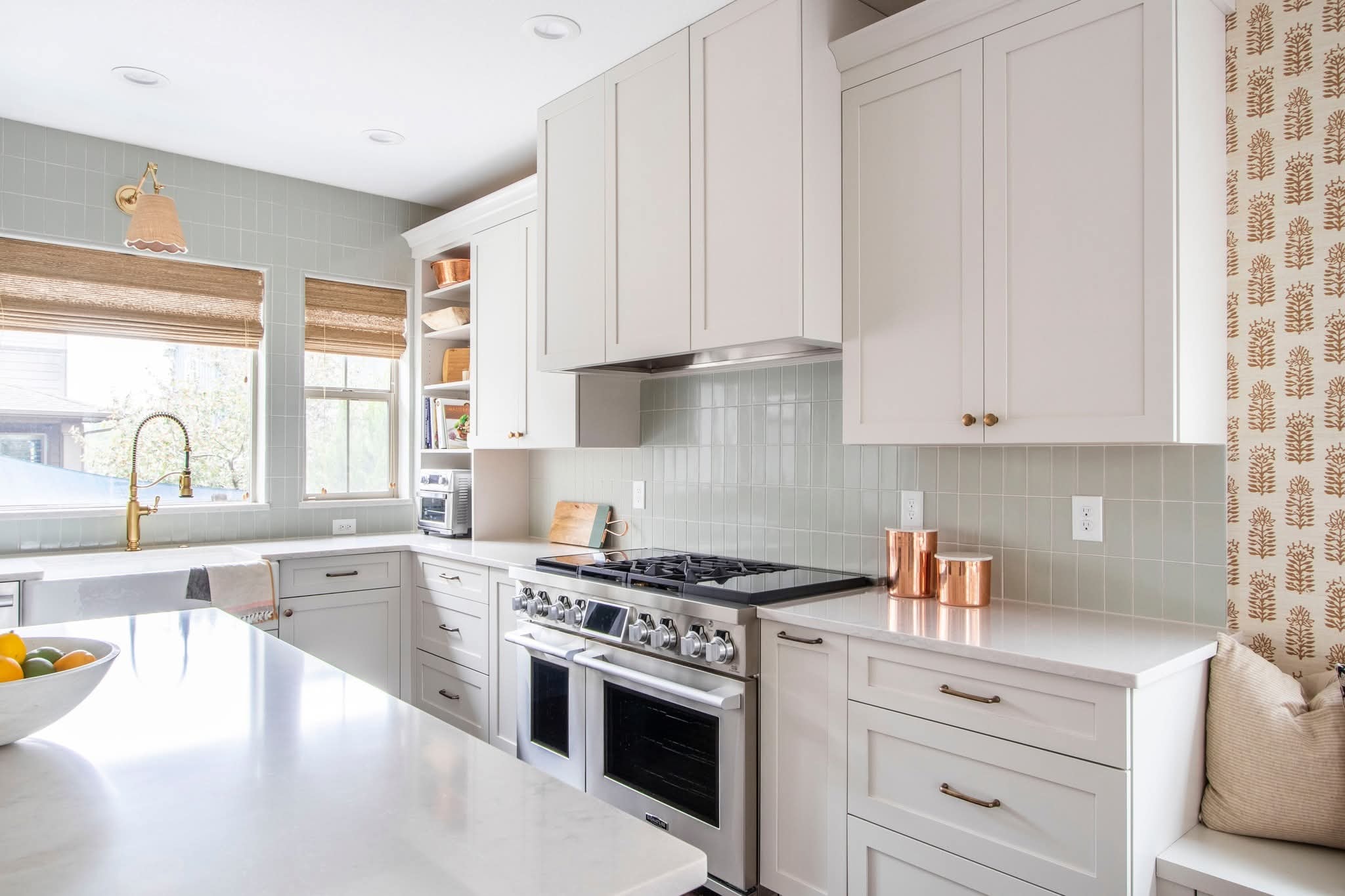 White and brass kitchen remodel by PrestigeCore